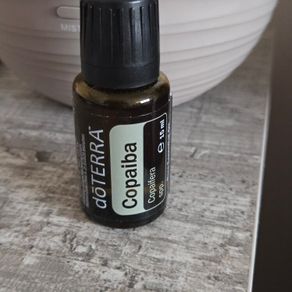 DoTERRA Copaiba Essential Oil 15 ml  Brand new and unopened. 100% pure therapeutic grade essential oil, known for its soothing properties, calming aroma, and supporting wellness.