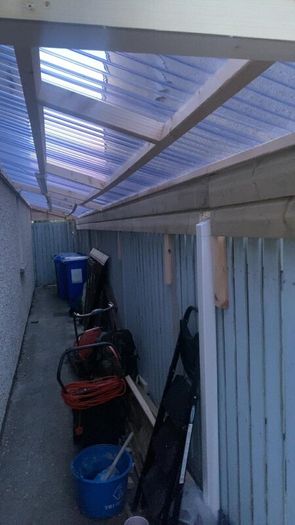 Pergola feature wall and side entrances