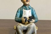 Vintage Porcelain Shoe Cobbler Sitting On Bench Figurine 5 Inches High