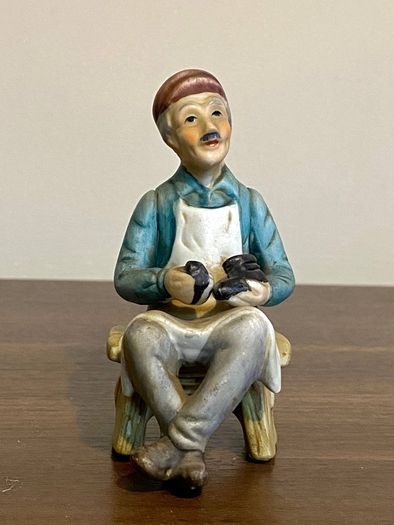 Vintage Porcelain Shoe Cobbler Sitting On Bench Figurine 5 Inches High
