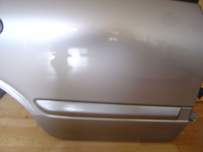 almera -n16 '06  Right Rear silver door in perfect condition!