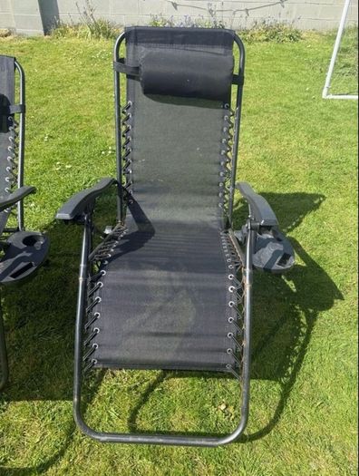2 black recliner garden chairs