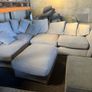 Grey corner sofa with scatter cushions and footstool Image 3