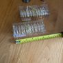 4 napkin holders (new) and 2 used candlesticks Image 3