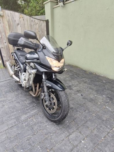 2007 black susuki bandit 1250 including luggage boxes .