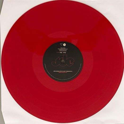 Autographed copy. A Plastic Rose - Flickering Light of an Inner War. Northern Ireland rock band. Limited edition - translucent red and blue vinyl. Like new. Bargain!