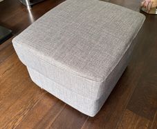 Grey footstool