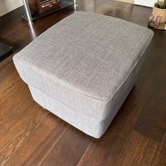 Grey footstool