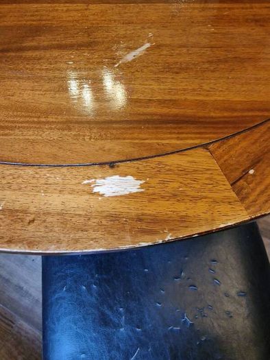 Round wooden table and four chairs