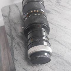 Canon FD 85-300mm f/4.5 S.S.C. vintage telephoto zoom lens. [1, 2]