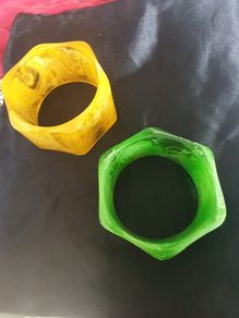 2 vibrantly colored plastic bangles