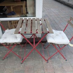 outdoor folding table and chair set including cuchions