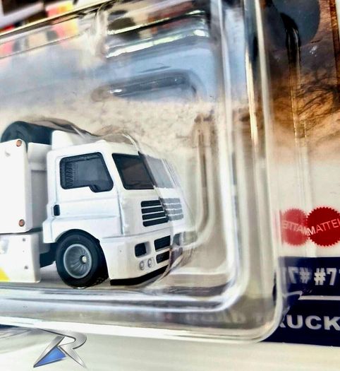 Hotwheels Toyota Off Road Truck with Fleet Street transporter.