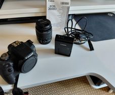 Canon 2000D with 18-55mm lens and bag