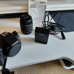Canon 2000D with 18-55mm lens and bag