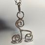 Sterling silver Triskele pendant on 18 or 20 inch chain. Image 3
