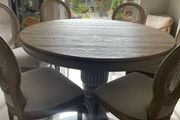Dining table round 140cm with 6 rattan back chairs