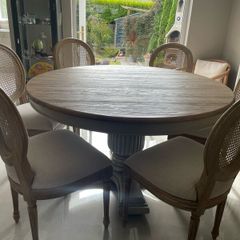 Dining table round 140cm with 6 rattan back chairs