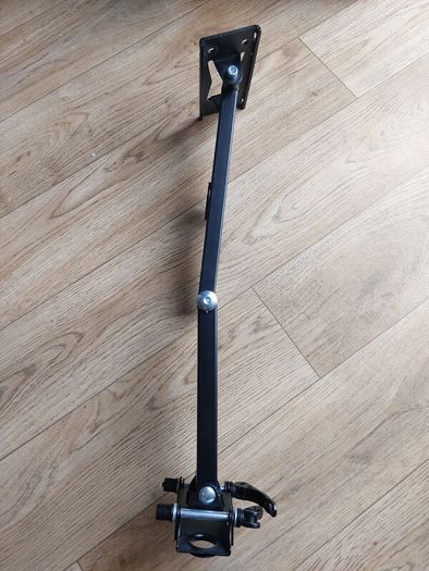 Heavy-duty adjustable monitor/display mounting arm in very good condition.