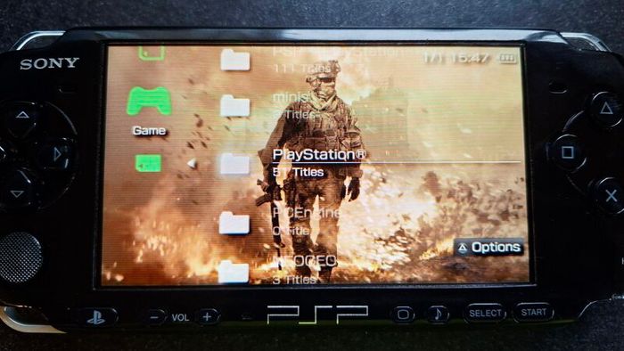 Modded Black PSP Slim 3000 128GB with games