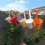 Set of 7 Colorful Hanging Metal Planters Image 9