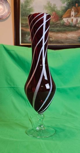 Elegant Murano-style vase made of art glass in ruby red with white spiral stripes