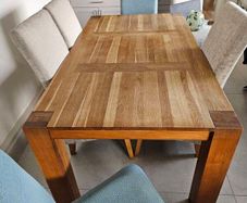 dining table and chairs oak table very good quality and solid chairs are as new  o marks or stains