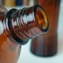 484 - Set of 4 Vintage Brown Amber Glass Screw Top Collectible Decorative Bottles Image 10