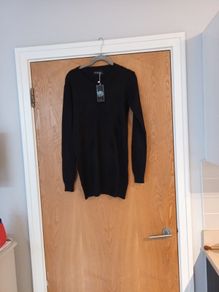 Buisdaei Long Black Jumper. S  14-16.   B