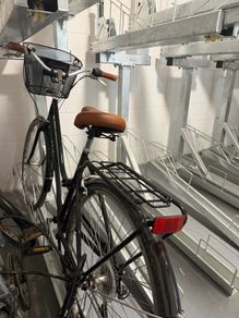 Basket bicycle, with helmet and chargeable rear light,
