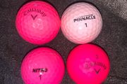 (4) Pink golf balls