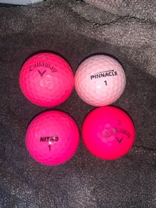 (4) Pink golf balls