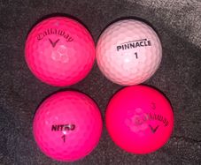 (4) Pink golf balls