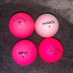 (4) Pink golf balls