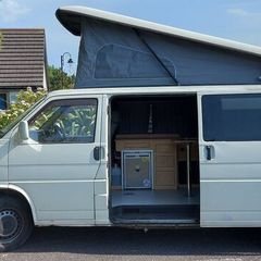 Campervan with damaged engine.