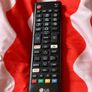 LG TV with Samsung soundbar and speaker Image 3