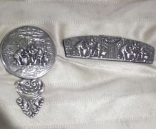 a antique vanity mirror with a comb case and comb by jensons of sweden