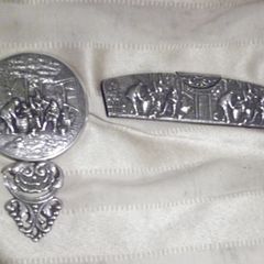 a antique vanity mirror with a comb case and comb by jensons of sweden