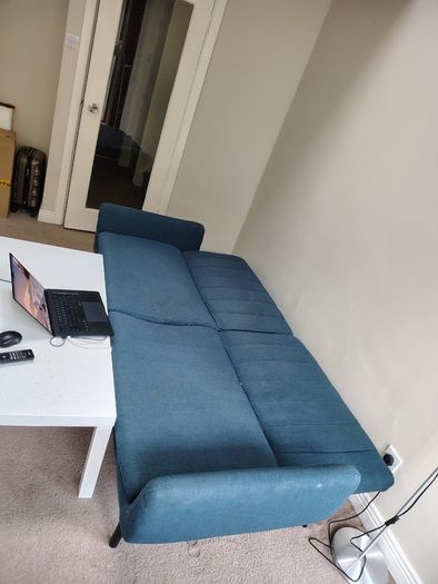 Blue fabric sofa bed