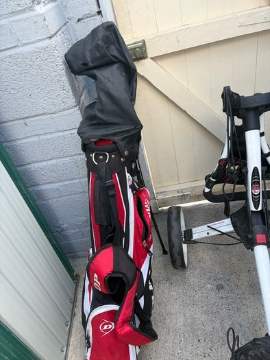 golf clubs and trolley