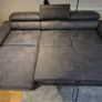 dark grey corner sofa with sleeping and storage Image 7