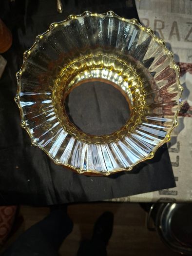 A Beautiful Amber Glass Oil Lamp Shade featuring a bulbous, ribbed body and a wide, ruffled, fluted rim, Postage Available