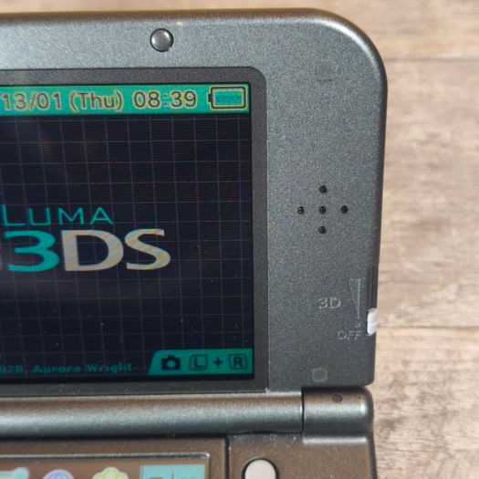 New Nintendo 3ds xl 128gb sd card hshop 1000s games for free VGC