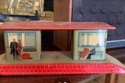 A tin plate Brimtoy painted metal model railroad station platform