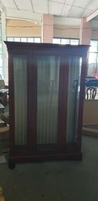 Tall antique glass display cabinet