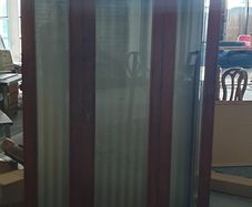 Tall antique glass display cabinet