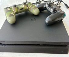 PS4 slim console & 2 controllers