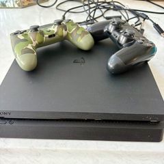 PS4 slim console & 2 controllers