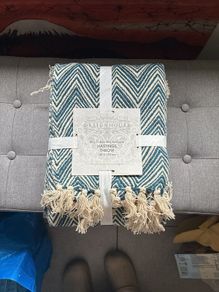 Blue and white throw for collection from Greystones