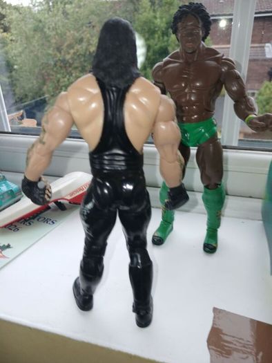 Wrestlers x 2 Undertaker and Kofi